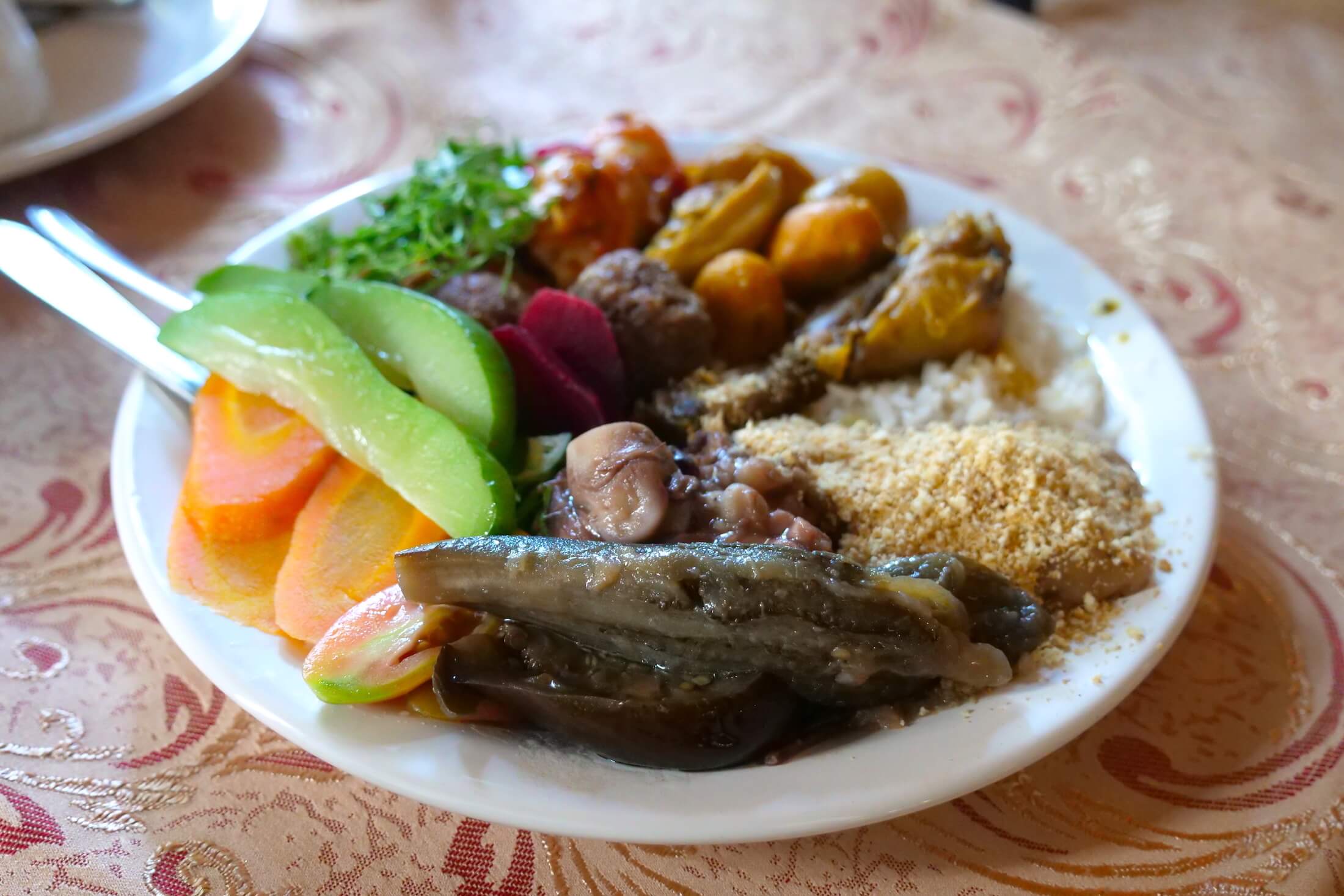 combination of Pequi, with cooked veggies, fried meats, and raw salads for lunch at Restaurante Braseiro